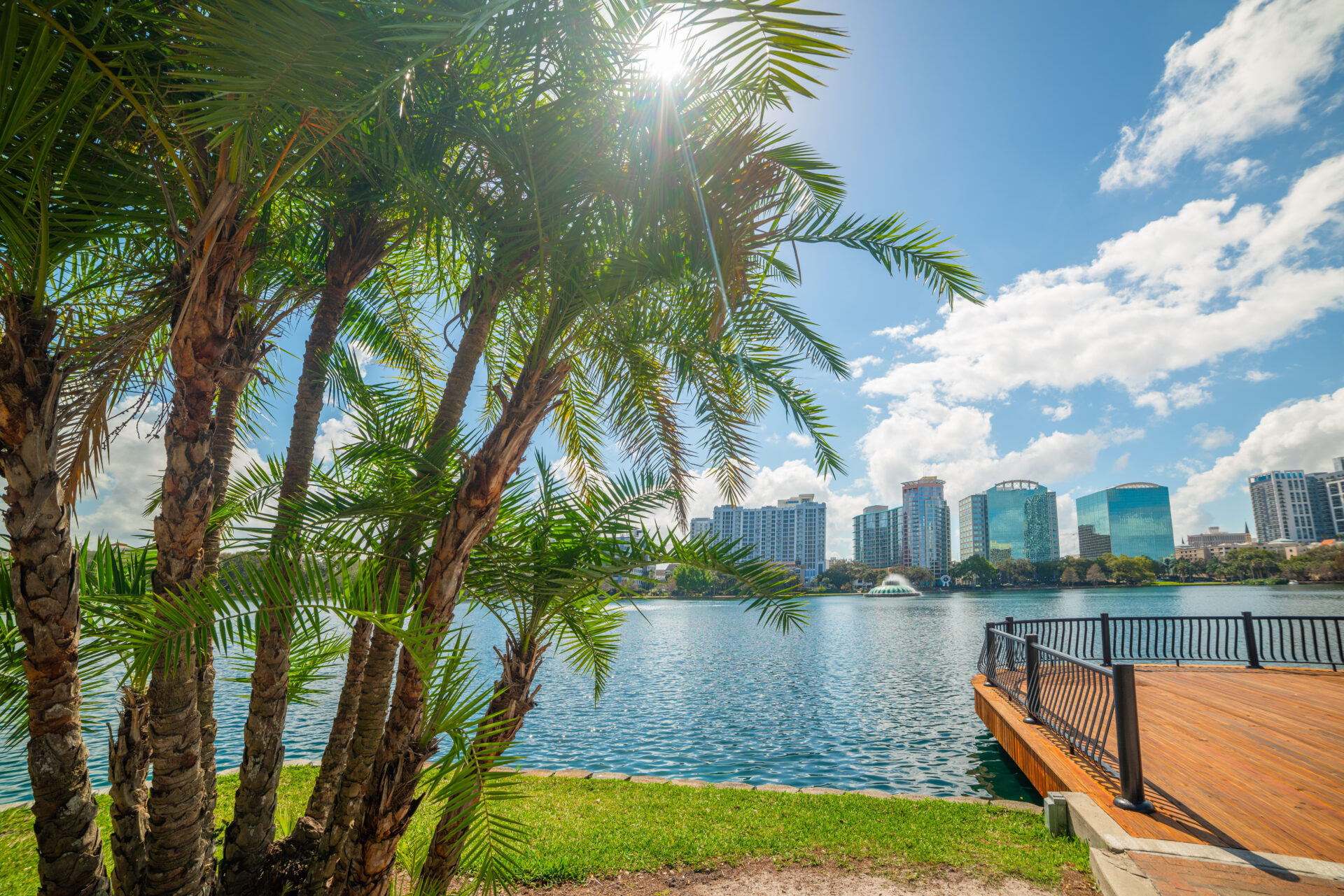 Sun shining over beautiful Lake Eola park in Orlando Sun shining over beautiful Lake Eola park in Orlando